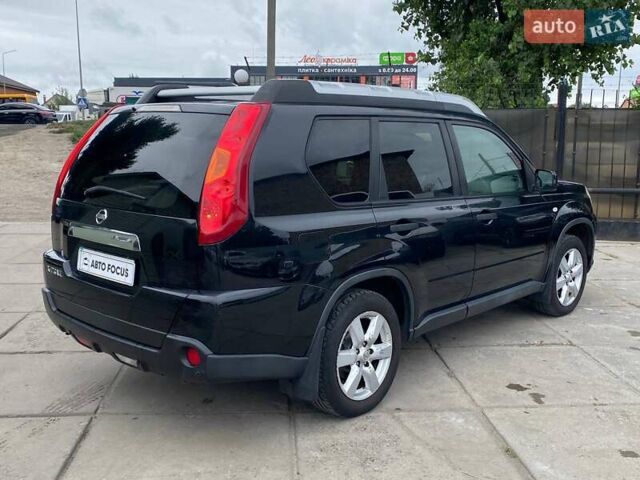 Черный Ниссан ИксТрейл, объемом двигателя 2 л и пробегом 295 тыс. км за 8090 $, фото 4 на Automoto.ua