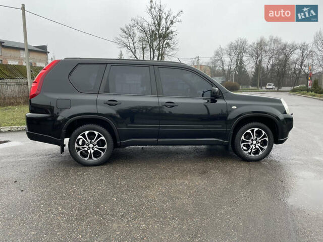 Черный Ниссан ИксТрейл, объемом двигателя 2 л и пробегом 210 тыс. км за 8750 $, фото 11 на Automoto.ua