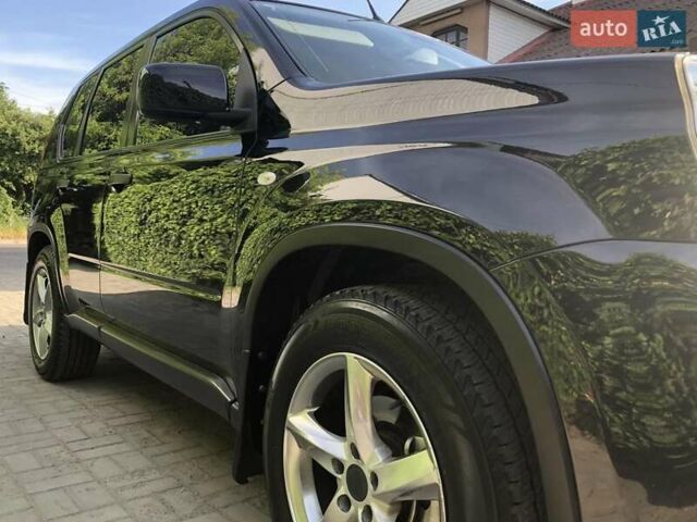 Черный Ниссан ИксТрейл, объемом двигателя 2 л и пробегом 140 тыс. км за 11600 $, фото 42 на Automoto.ua