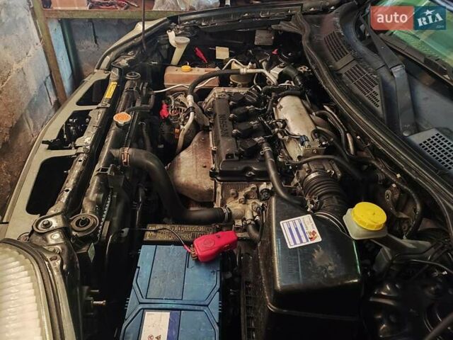 Черный Ниссан ИксТрейл, объемом двигателя 2.49 л и пробегом 195 тыс. км за 5200 $, фото 11 на Automoto.ua