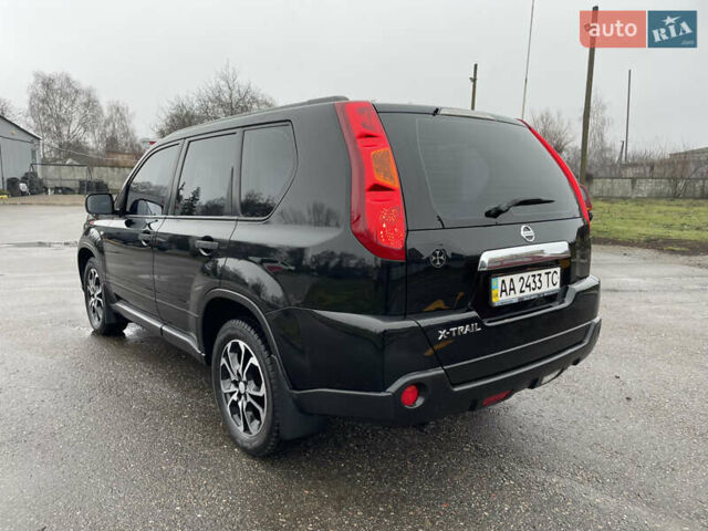 Черный Ниссан ИксТрейл, объемом двигателя 2 л и пробегом 210 тыс. км за 8750 $, фото 6 на Automoto.ua