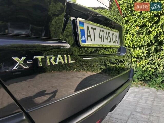 Черный Ниссан ИксТрейл, объемом двигателя 2 л и пробегом 140 тыс. км за 11600 $, фото 43 на Automoto.ua