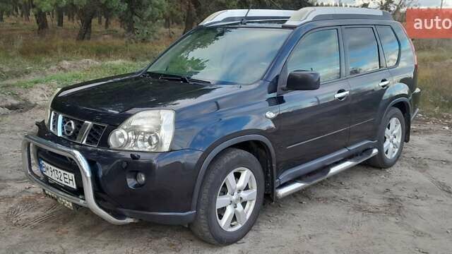 Черный Ниссан ИксТрейл, объемом двигателя 2 л и пробегом 259 тыс. км за 9999 $, фото 1 на Automoto.ua