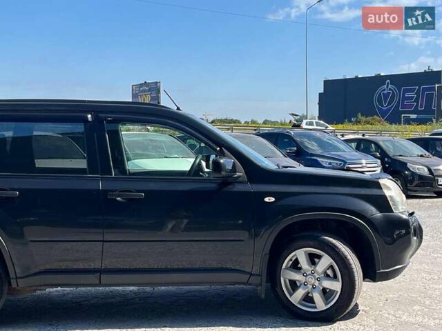 Черный Ниссан ИксТрейл, объемом двигателя 2 л и пробегом 279 тыс. км за 9240 $, фото 4 на Automoto.ua