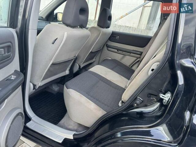 Чорний Ніссан ІксТрейл, об'ємом двигуна 2.2 л та пробігом 295 тис. км за 3850 $, фото 9 на Automoto.ua