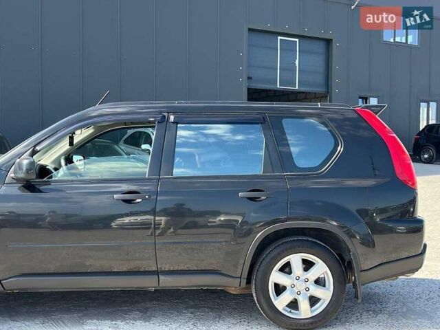 Черный Ниссан ИксТрейл, объемом двигателя 2 л и пробегом 279 тыс. км за 9240 $, фото 10 на Automoto.ua