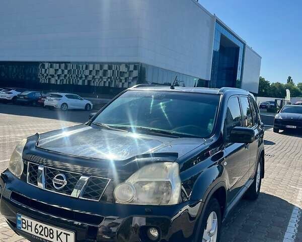 Черный Ниссан ИксТрейл, объемом двигателя 2 л и пробегом 190 тыс. км за 8700 $, фото 1 на Automoto.ua