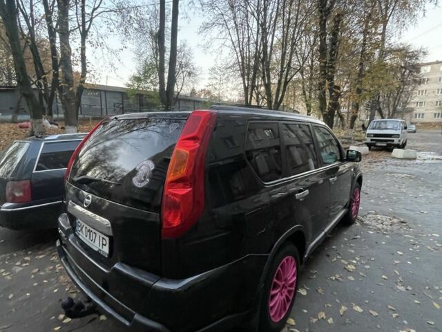 Чорний Ніссан ІксТрейл, об'ємом двигуна 2 л та пробігом 305 тис. км за 4299 $, фото 13 на Automoto.ua