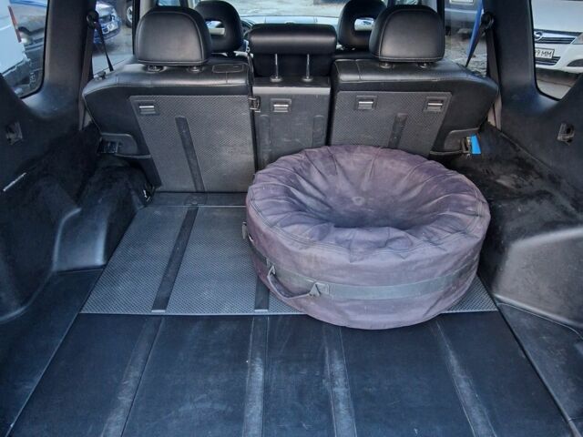 Черный Ниссан ИксТрейл, объемом двигателя 2.5 л и пробегом 340 тыс. км за 7299 $, фото 9 на Automoto.ua