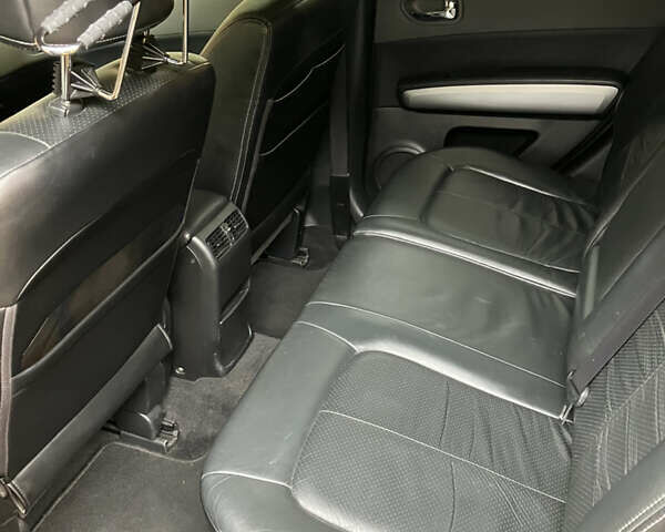 Черный Ниссан ИксТрейл, объемом двигателя 2 л и пробегом 257 тыс. км за 9147 $, фото 18 на Automoto.ua