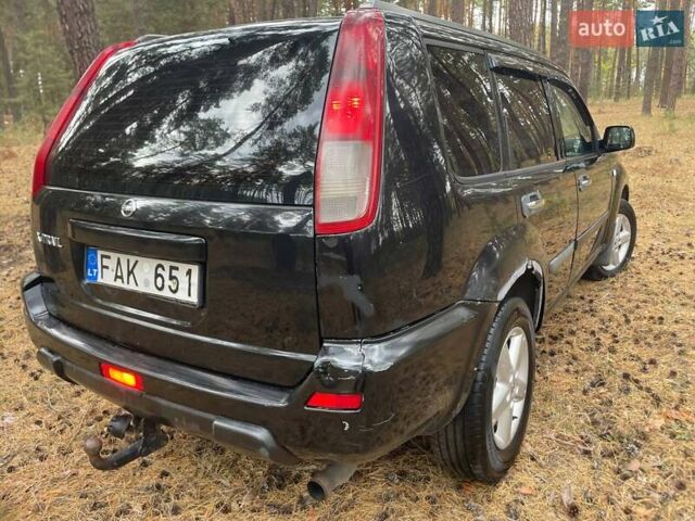 Чорний Ніссан ІксТрейл, об'ємом двигуна 2.2 л та пробігом 311 тис. км за 3500 $, фото 3 на Automoto.ua