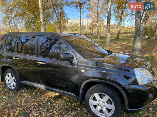 Черный Ниссан ИксТрейл, объемом двигателя 2 л и пробегом 214 тыс. км за 11500 $, фото 4 на Automoto.ua