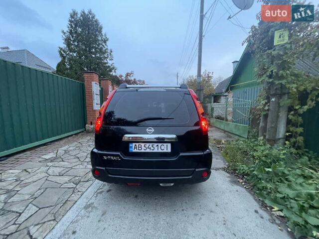Черный Ниссан ИксТрейл, объемом двигателя 2.5 л и пробегом 236 тыс. км за 8600 $, фото 4 на Automoto.ua
