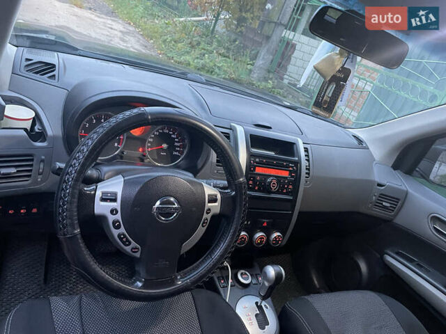 Черный Ниссан ИксТрейл, объемом двигателя 2.5 л и пробегом 236 тыс. км за 8600 $, фото 14 на Automoto.ua