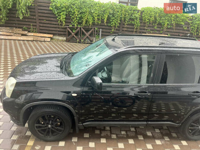 Черный Ниссан ИксТрейл, объемом двигателя 2 л и пробегом 175 тыс. км за 11500 $, фото 1 на Automoto.ua