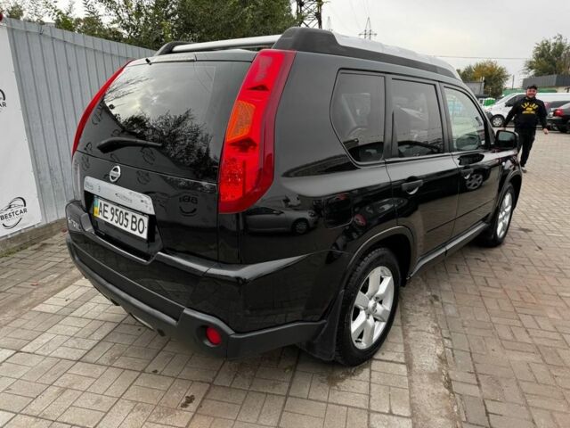 Чорний Ніссан ІксТрейл, об'ємом двигуна 2 л та пробігом 219 тис. км за 5800 $, фото 2 на Automoto.ua