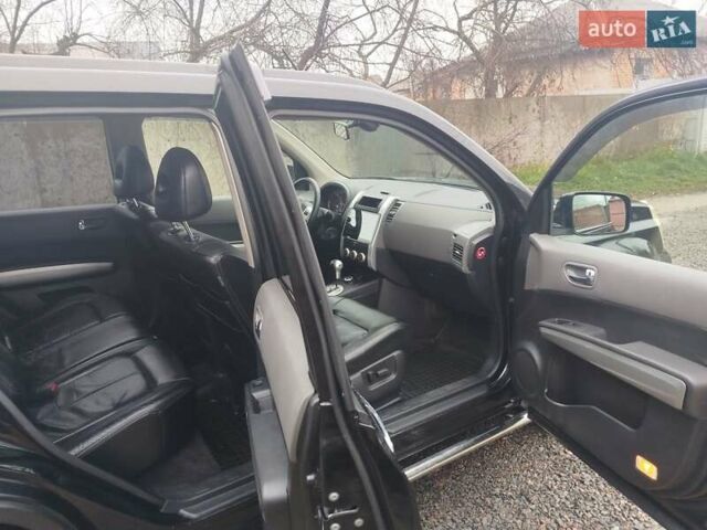 Черный Ниссан ИксТрейл, объемом двигателя 2.5 л и пробегом 197 тыс. км за 8500 $, фото 7 на Automoto.ua