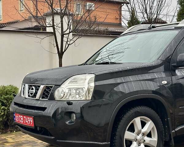 Черный Ниссан ИксТрейл, объемом двигателя 2 л и пробегом 264 тыс. км за 11250 $, фото 5 на Automoto.ua