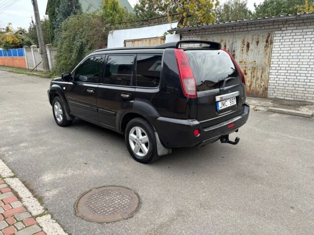 Чорний Ніссан ІксТрейл, об'ємом двигуна 2.2 л та пробігом 367 тис. км за 3500 $, фото 3 на Automoto.ua