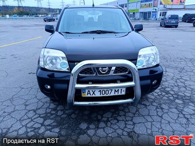 Черный Ниссан ИксТрейл, объемом двигателя 2.5 л и пробегом 170 тыс. км за 8600 $, фото 8 на Automoto.ua