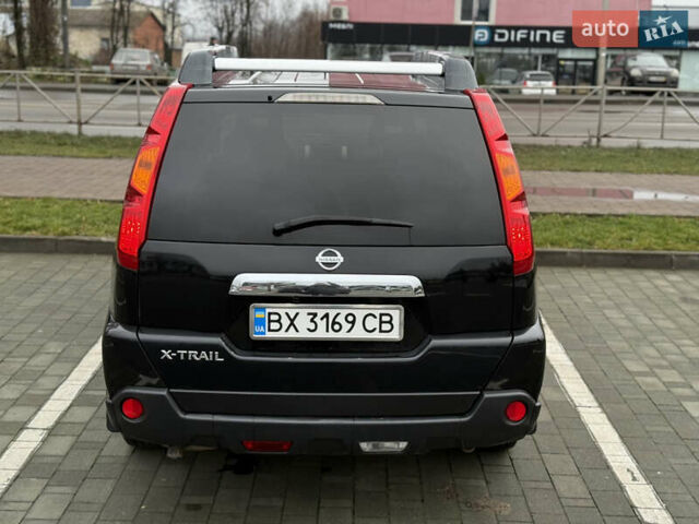 Черный Ниссан ИксТрейл, объемом двигателя 2.49 л и пробегом 197 тыс. км за 8888 $, фото 3 на Automoto.ua