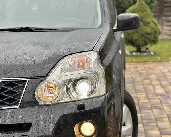 Черный Ниссан ИксТрейл, объемом двигателя 2 л и пробегом 264 тыс. км за 11250 $, фото 14 на Automoto.ua