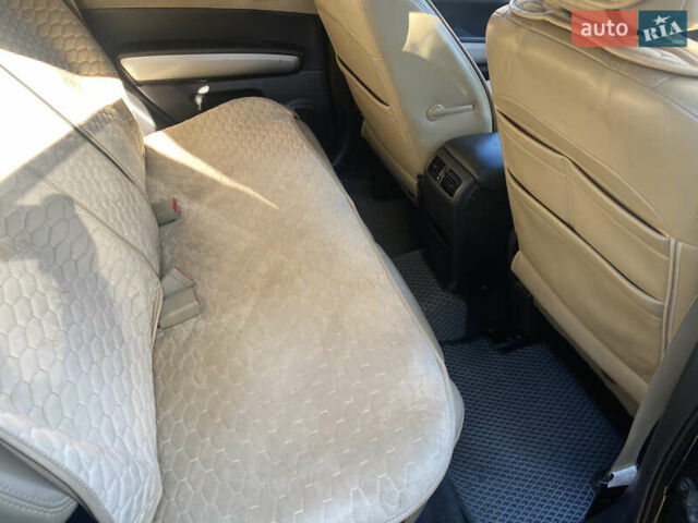 Черный Ниссан ИксТрейл, объемом двигателя 2 л и пробегом 214 тыс. км за 11500 $, фото 13 на Automoto.ua