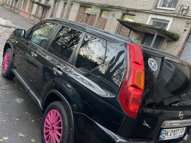 Чорний Ніссан ІксТрейл, об'ємом двигуна 2 л та пробігом 305 тис. км за 4299 $, фото 3 на Automoto.ua