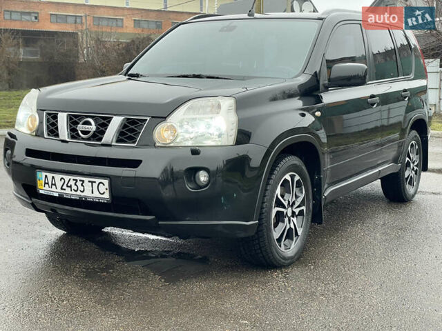 Черный Ниссан ИксТрейл, объемом двигателя 2 л и пробегом 210 тыс. км за 8750 $, фото 15 на Automoto.ua