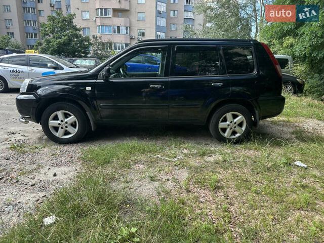 Чорний Ніссан ІксТрейл, об'ємом двигуна 2.49 л та пробігом 256 тис. км за 7000 $, фото 2 на Automoto.ua