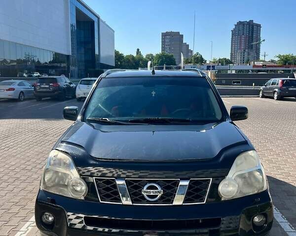 Черный Ниссан ИксТрейл, объемом двигателя 2 л и пробегом 190 тыс. км за 8700 $, фото 5 на Automoto.ua