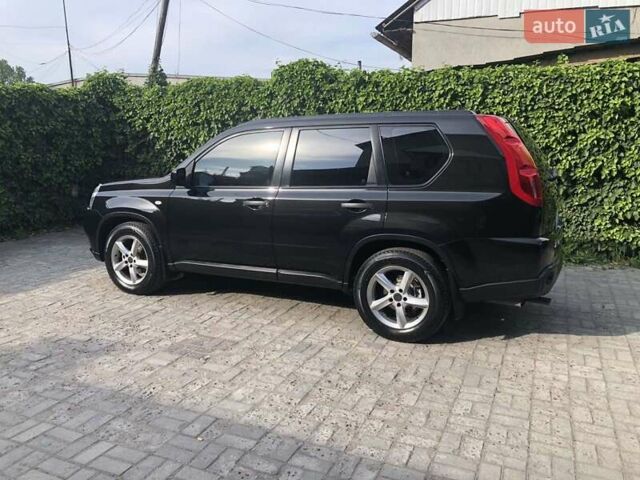 Черный Ниссан ИксТрейл, объемом двигателя 2 л и пробегом 140 тыс. км за 11600 $, фото 21 на Automoto.ua