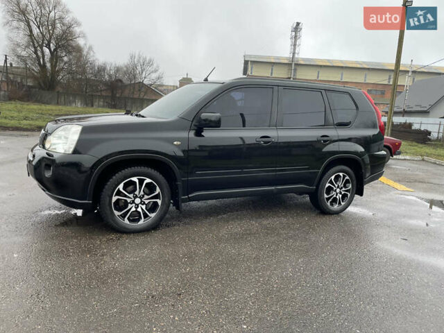 Черный Ниссан ИксТрейл, объемом двигателя 2 л и пробегом 210 тыс. км за 8750 $, фото 5 на Automoto.ua