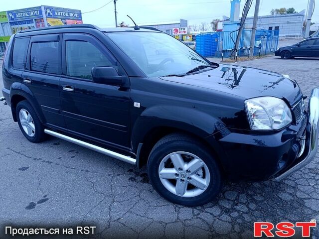 Черный Ниссан ИксТрейл, объемом двигателя 2.5 л и пробегом 170 тыс. км за 8600 $, фото 7 на Automoto.ua