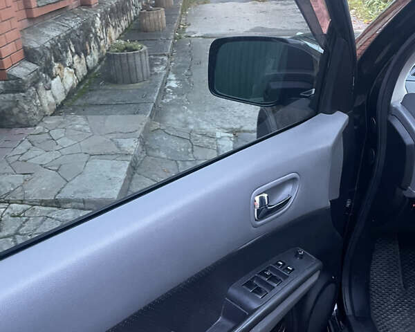 Черный Ниссан ИксТрейл, объемом двигателя 2.5 л и пробегом 236 тыс. км за 8600 $, фото 18 на Automoto.ua