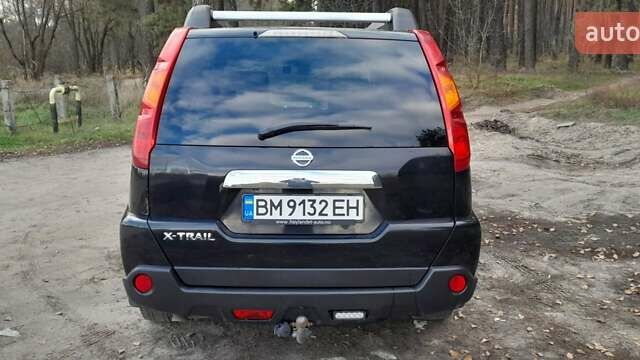 Черный Ниссан ИксТрейл, объемом двигателя 2 л и пробегом 259 тыс. км за 9999 $, фото 7 на Automoto.ua