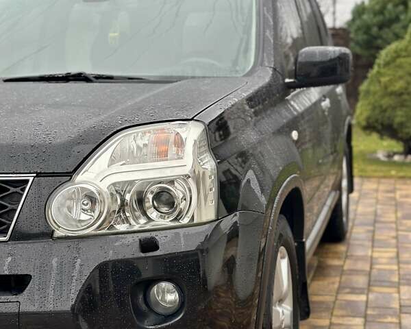 Черный Ниссан ИксТрейл, объемом двигателя 2 л и пробегом 264 тыс. км за 11250 $, фото 6 на Automoto.ua