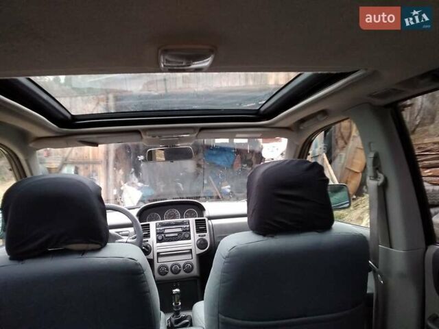 Чорний Ніссан ІксТрейл, об'ємом двигуна 2.2 л та пробігом 300 тис. км за 8281 $, фото 1 на Automoto.ua