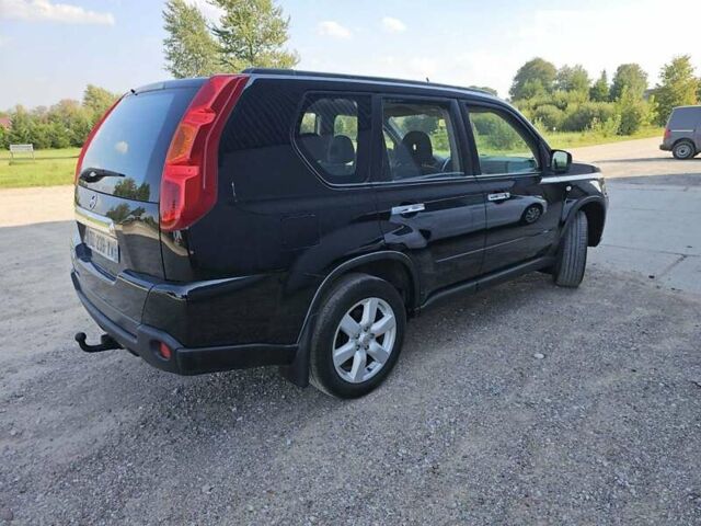 Чорний Ніссан ІксТрейл, об'ємом двигуна 2 л та пробігом 290 тис. км за 11700 $, фото 2 на Automoto.ua