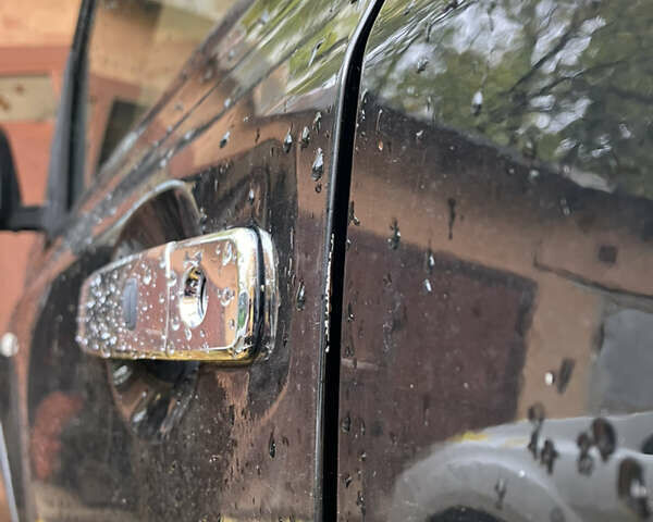 Черный Ниссан ИксТрейл, объемом двигателя 2 л и пробегом 257 тыс. км за 9147 $, фото 4 на Automoto.ua