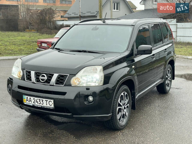 Черный Ниссан ИксТрейл, объемом двигателя 2 л и пробегом 210 тыс. км за 8750 $, фото 16 на Automoto.ua