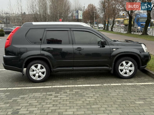 Черный Ниссан ИксТрейл, объемом двигателя 2.49 л и пробегом 197 тыс. км за 8888 $, фото 11 на Automoto.ua