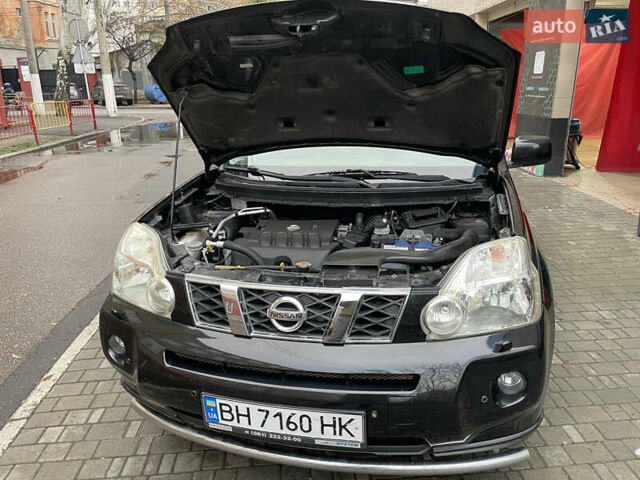 Черный Ниссан ИксТрейл, объемом двигателя 2 л и пробегом 193 тыс. км за 8700 $, фото 25 на Automoto.ua