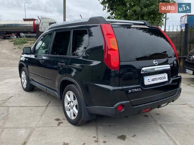 Черный Ниссан ИксТрейл, объемом двигателя 2 л и пробегом 295 тыс. км за 8090 $, фото 6 на Automoto.ua
