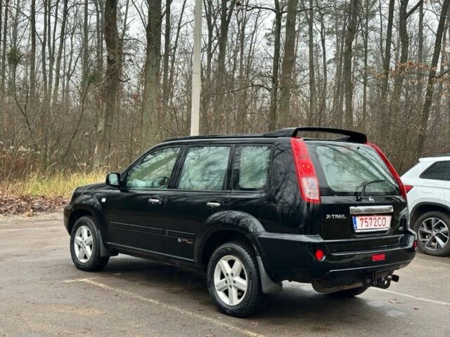 Черный Ниссан ИксТрейл, объемом двигателя 2.2 л и пробегом 180 тыс. км за 3358 $, фото 3 на Automoto.ua