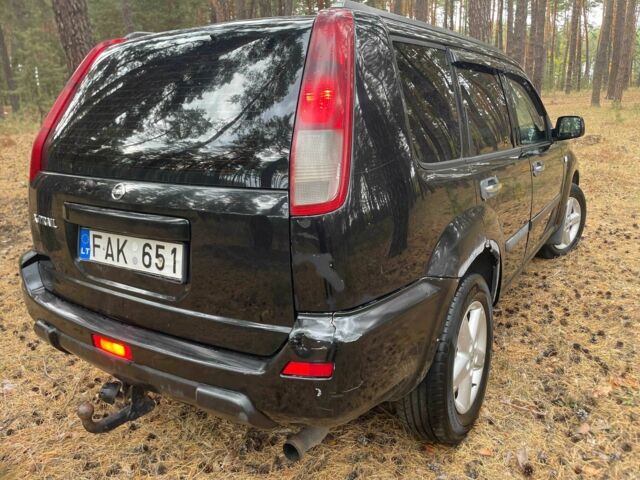 Чорний Ніссан ІксТрейл, об'ємом двигуна 2.2 л та пробігом 311 тис. км за 3500 $, фото 3 на Automoto.ua