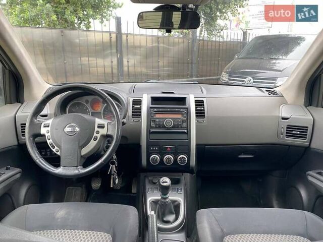 Черный Ниссан ИксТрейл, объемом двигателя 2 л и пробегом 295 тыс. км за 8090 $, фото 13 на Automoto.ua