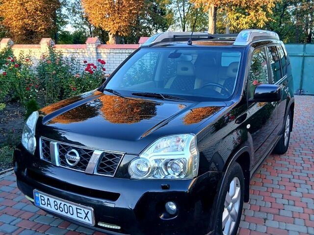 Чорний Ніссан ІксТрейл, об'ємом двигуна 2 л та пробігом 330 тис. км за 9300 $, фото 1 на Automoto.ua
