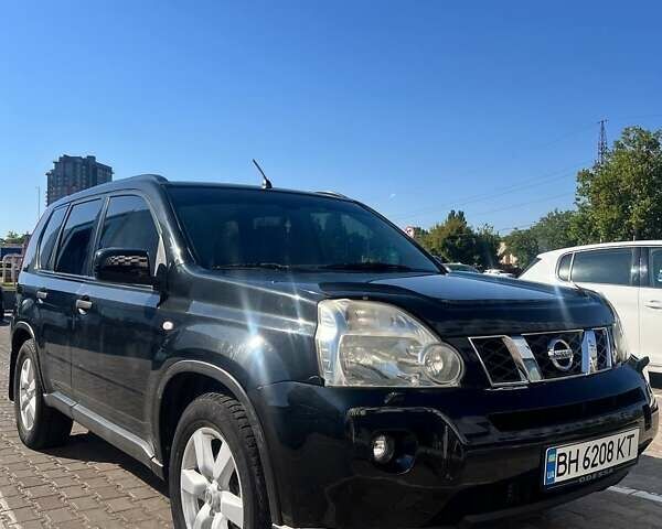 Черный Ниссан ИксТрейл, объемом двигателя 2 л и пробегом 190 тыс. км за 8700 $, фото 2 на Automoto.ua