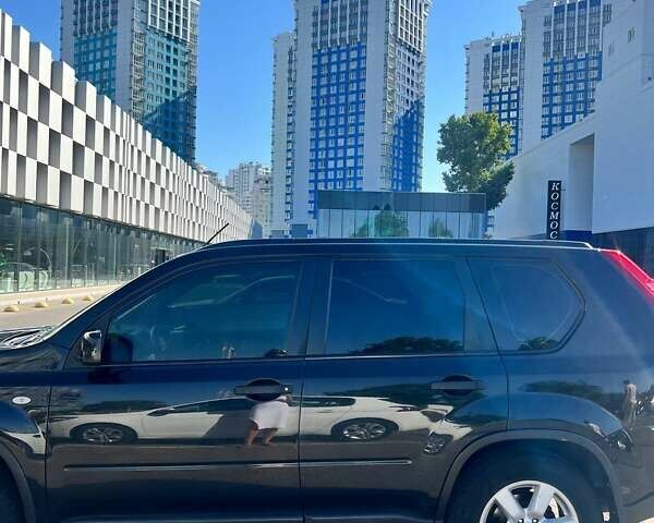 Черный Ниссан ИксТрейл, объемом двигателя 2 л и пробегом 190 тыс. км за 8700 $, фото 4 на Automoto.ua